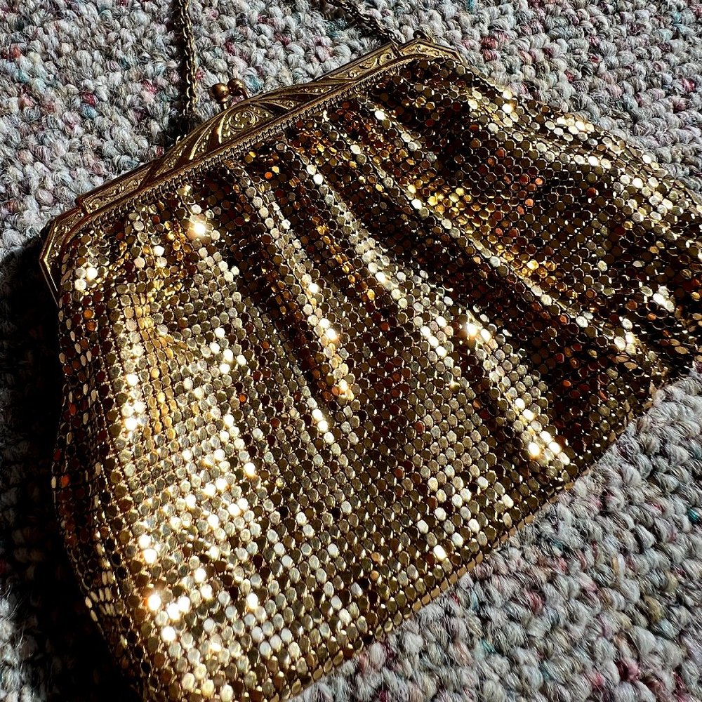 Gold shimmery clutch